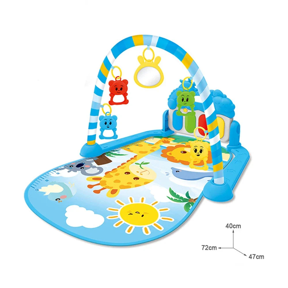 Tapis d'éveil - bébé sur le ventre pendant le jeu