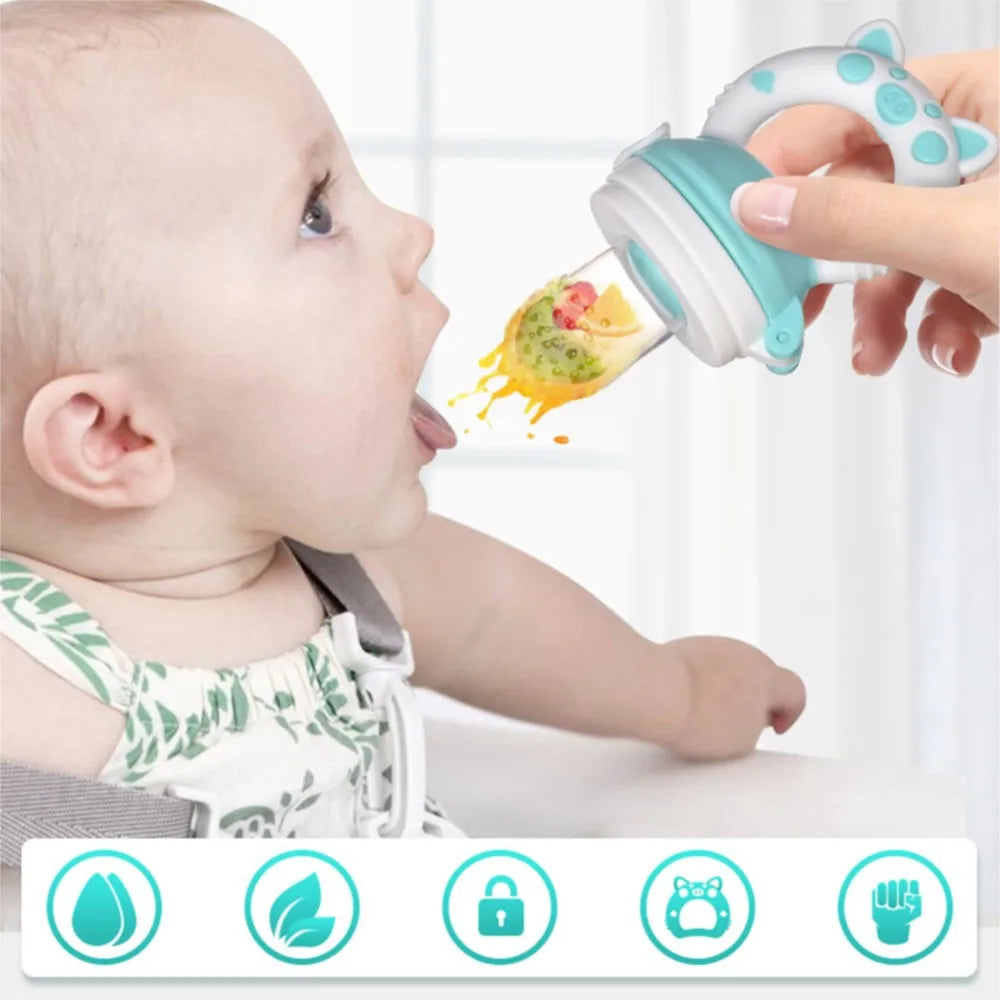 Grignoteuse cochon - bébé découvrant de nouvelles saveurs