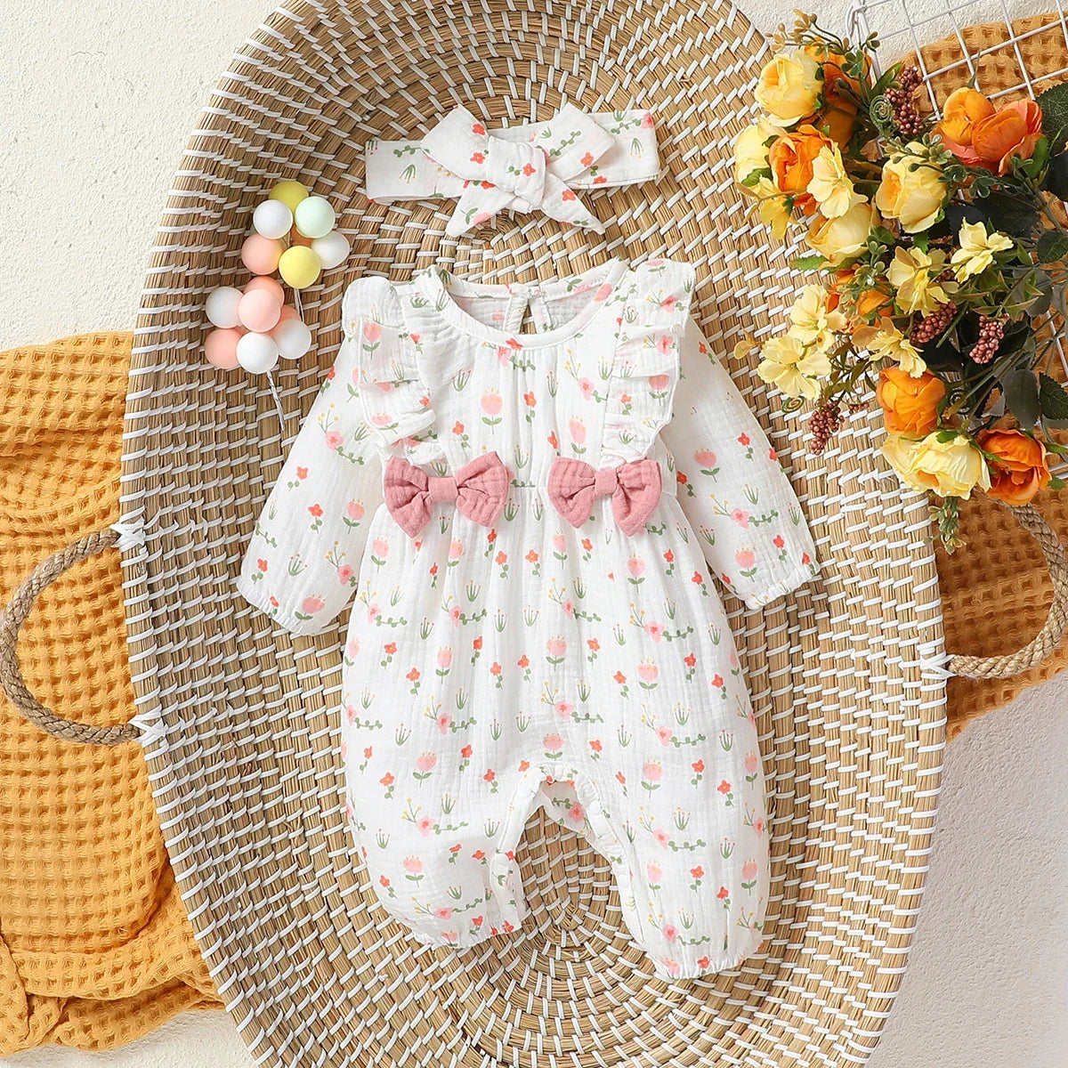Combinaison bébé fille fleurie avec bandeau assorti